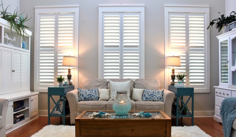 Houston designer living room with chic shutters 